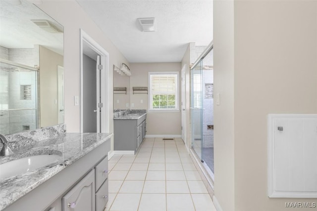 733 Cartwright Rd, Titus, AL 36080 - bathroom featuring visible vents, a stall shower, and a sink