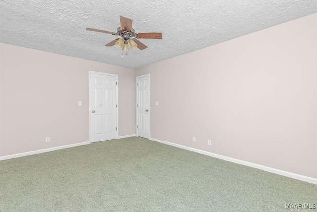 733 Cartwright Rd, Titus, AL 36080 - carpeted spare room with a textured ceiling, ceiling fan, and baseboards