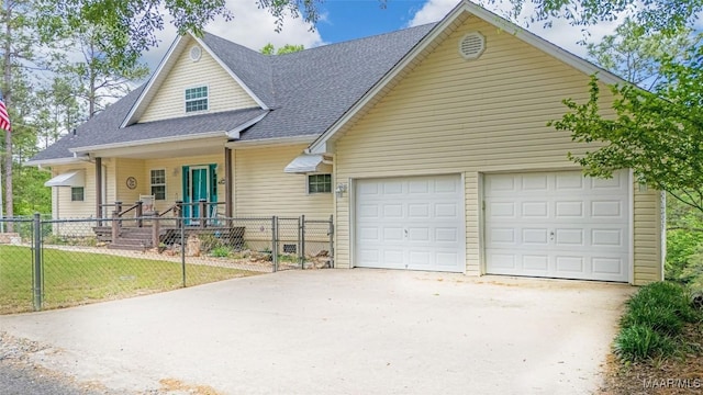 733 Cartwright Rd, Titus, AL 36080 - view of front of property with covered porch, fence private yard, driveway, roof with shingles, and an attached garage