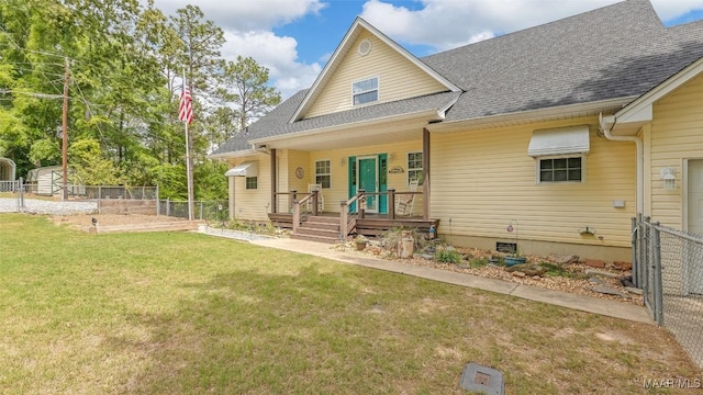 733 Cartwright Rd, Titus, AL 36080 - back of property with a porch, a yard, a shingled roof, and fence