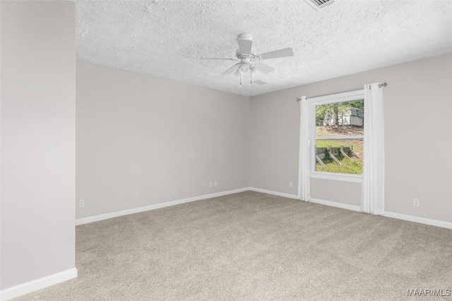 733 Cartwright Rd, Titus, AL 36080 - unfurnished room featuring a textured ceiling, ceiling fan, carpet flooring, and baseboards