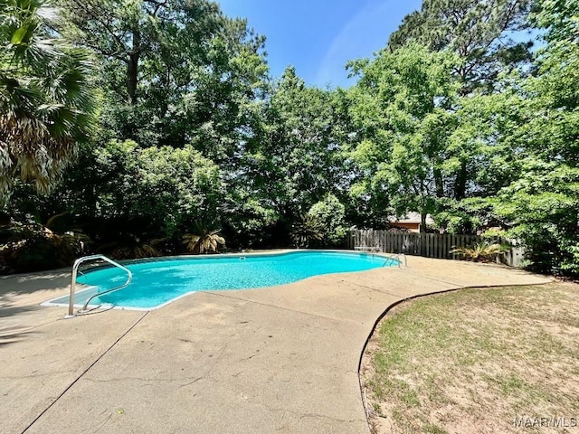 view of pool featuring fence, a patio, and a fenced in pool