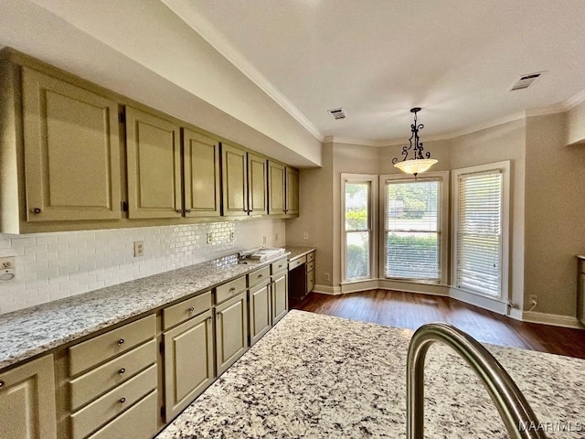 kitchen with baseboards, tasteful backsplash, ornamental molding, and dark wood-style flooring
