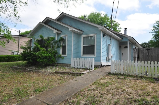 view of front of home with fence