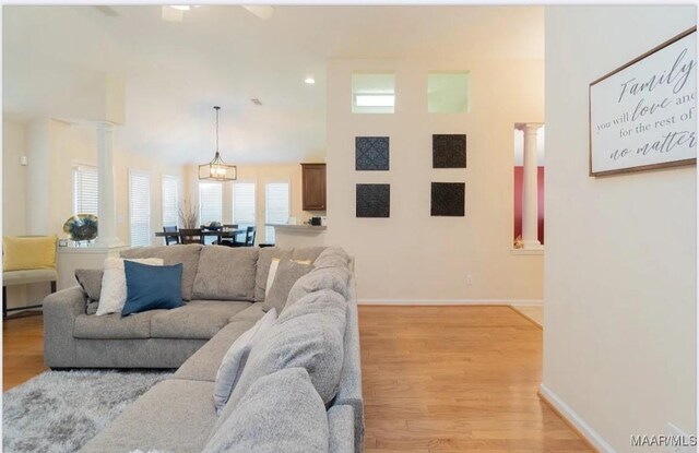 7648 Steele Ridge Dr, Montgomery, AL 36117 - living area with ornate columns, light wood-type flooring, baseboards, and recessed lighting
