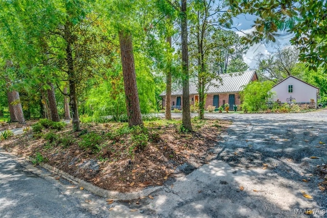 view of front of house with metal roof