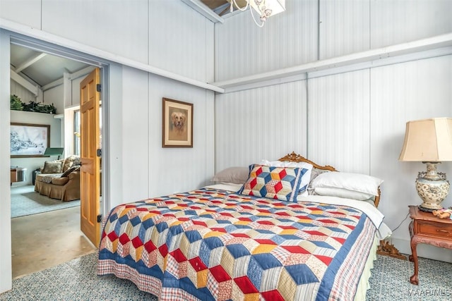 bedroom featuring concrete flooring