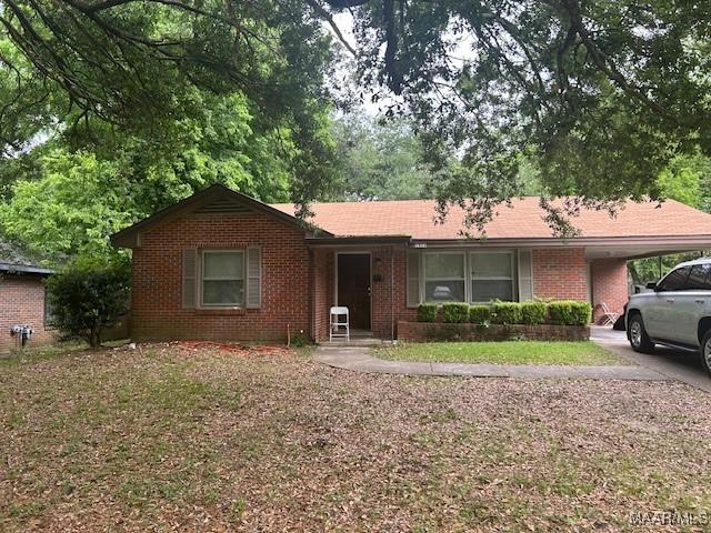 1311 Avalon Ln, Montgomery, AL 36111 - single story home featuring brick siding and a carport