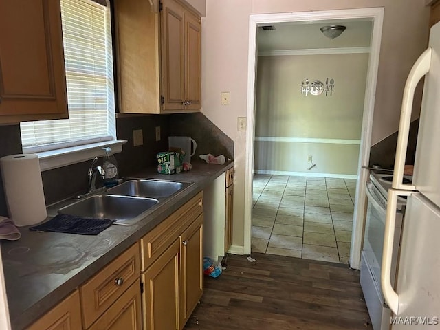 6072 Sherburn Rd, Montgomery, AL 36116 - kitchen featuring white appliances, crown molding, a sink, dark countertops, and dark wood-type flooring