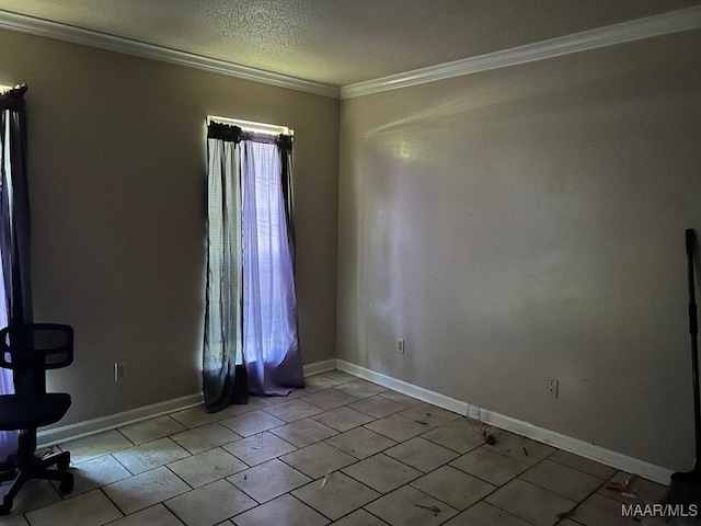 6072 Sherburn Rd, Montgomery, AL 36116 - empty room featuring crown molding, baseboards, and a textured ceiling