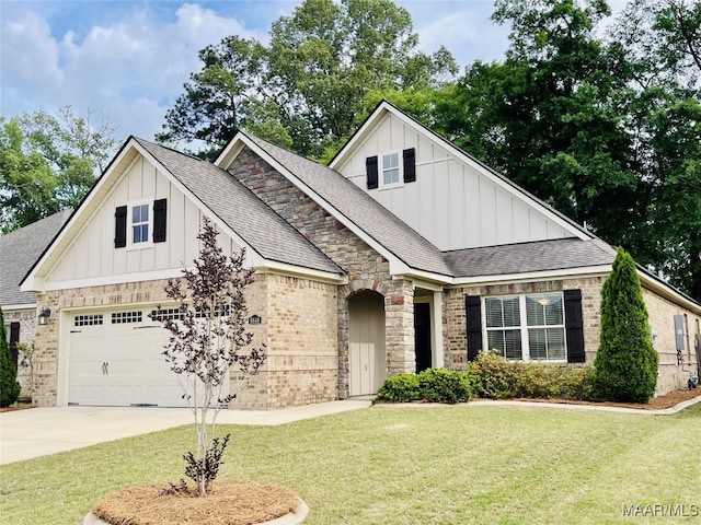 craftsman-style home with board and batten siding, brick siding, roof with shingles, a front yard, and concrete driveway