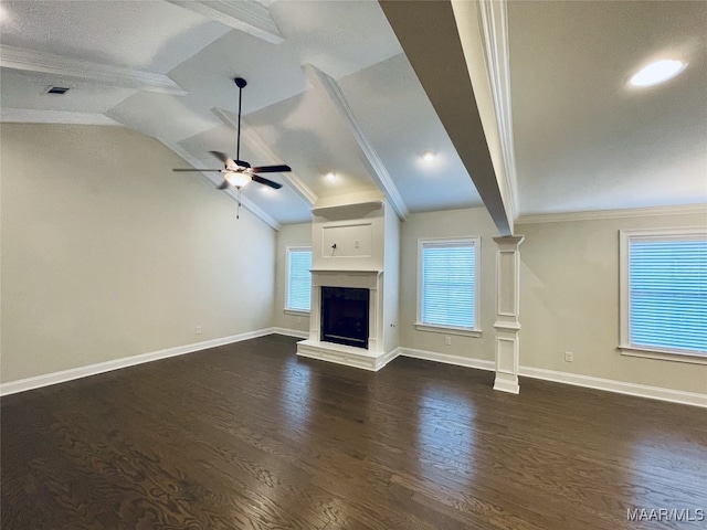 unfurnished living room featuring a fireplace with raised hearth, lofted ceiling with beams, dark wood-type flooring, a ceiling fan, and baseboards