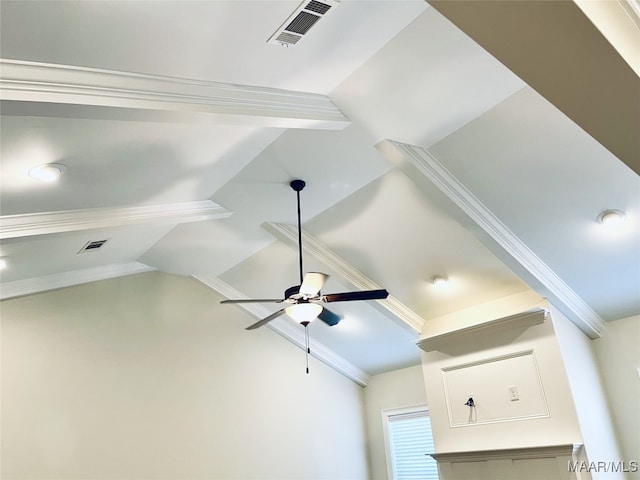 interior details featuring a ceiling fan, visible vents, and beam ceiling