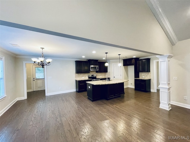 kitchen featuring a sink, appliances with stainless steel finishes, dark wood-style flooring, ornamental molding, and backsplash