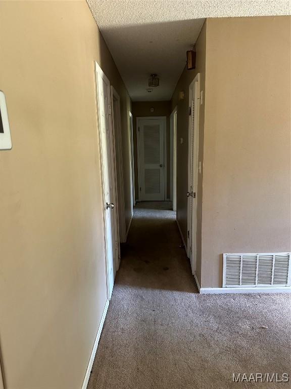 222 Woodbine St, Selma, AL 36701 - hall featuring carpet and baseboards