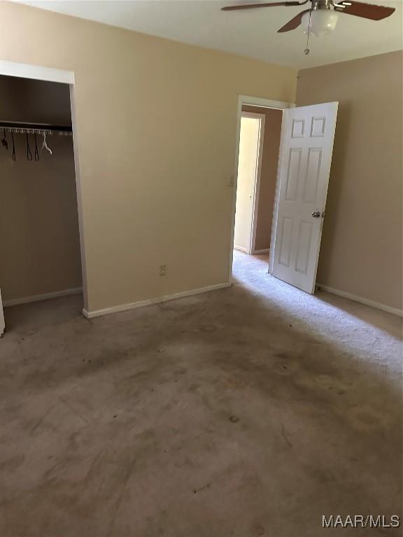 222 Woodbine St, Selma, AL 36701 - unfurnished bedroom featuring carpet, a closet, and baseboards