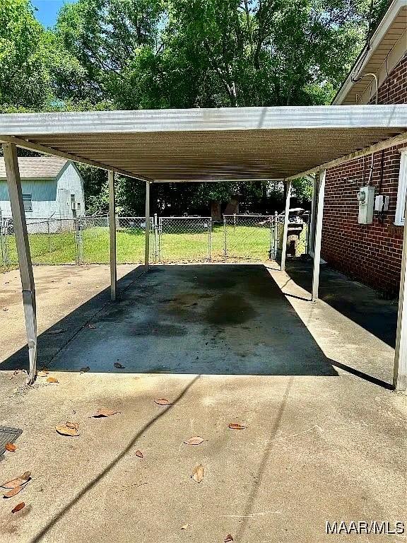 222 Woodbine St, Selma, AL 36701 - view of vehicle parking with concrete driveway