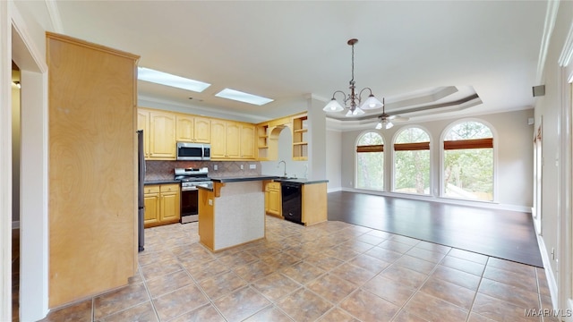 kitchen featuring a kitchen island, backsplash, appliances with stainless steel finishes, open shelves, and an inviting chandelier