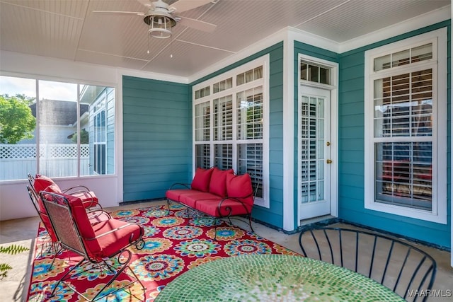 exterior space featuring a porch and a ceiling fan