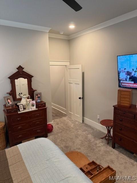 169 Foxfire Ct, Wetumpka, AL 36092 - carpeted bedroom with crown molding, baseboards, and ceiling fan