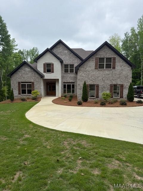 169 Foxfire Ct, Wetumpka, AL 36092 - craftsman house featuring stone siding and a front yard