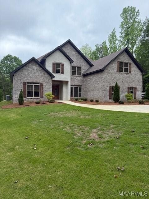 169 Foxfire Ct, Wetumpka, AL 36092 - view of front of property with stone siding and a front yard
