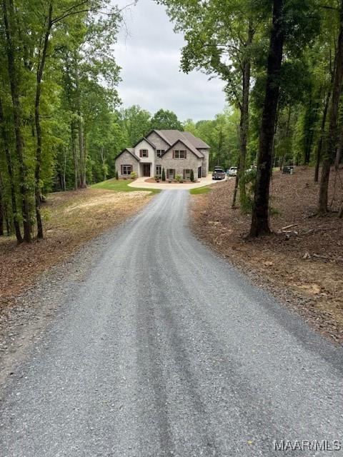 169 Foxfire Ct, Wetumpka, AL 36092 - view of front of property with a forest view and driveway
