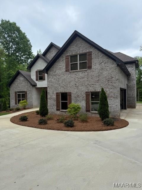 169 Foxfire Ct, Wetumpka, AL 36092 - view of front of property with curved driveway and brick siding