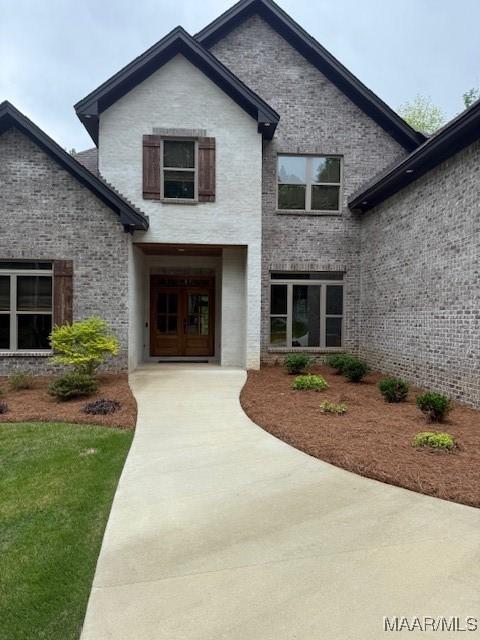 169 Foxfire Ct, Wetumpka, AL 36092 - view of exterior entry with brick siding