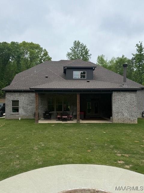 169 Foxfire Ct, Wetumpka, AL 36092 - rear view of property featuring a yard and a patio area