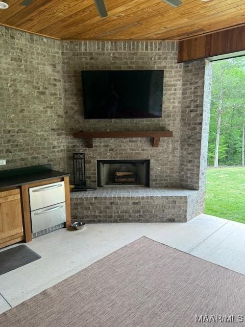 169 Foxfire Ct, Wetumpka, AL 36092 - interior space with wooden ceiling, carpet floors, and an outdoor brick fireplace