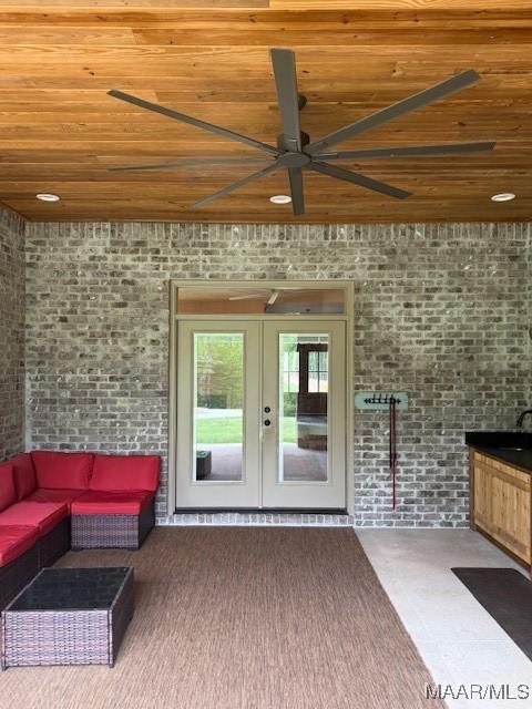 169 Foxfire Ct, Wetumpka, AL 36092 - view of patio with ceiling fan, an outdoor living space, and french doors