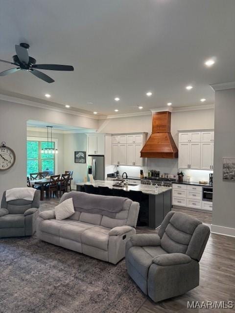 169 Foxfire Ct, Wetumpka, AL 36092 - living area featuring ornamental molding, baseboards, ceiling fan, dark wood-type flooring, and recessed lighting