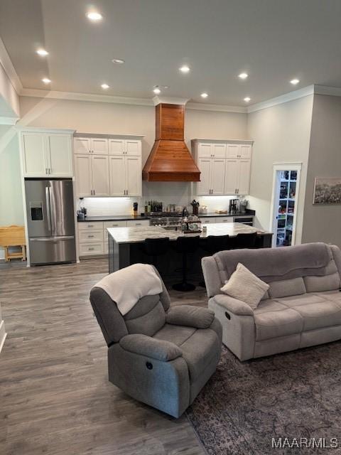 169 Foxfire Ct, Wetumpka, AL 36092 - living room featuring crown molding, recessed lighting, and dark wood-type flooring