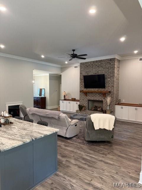 169 Foxfire Ct, Wetumpka, AL 36092 - living room with ceiling fan, a brick fireplace, recessed lighting, and wood finished floors