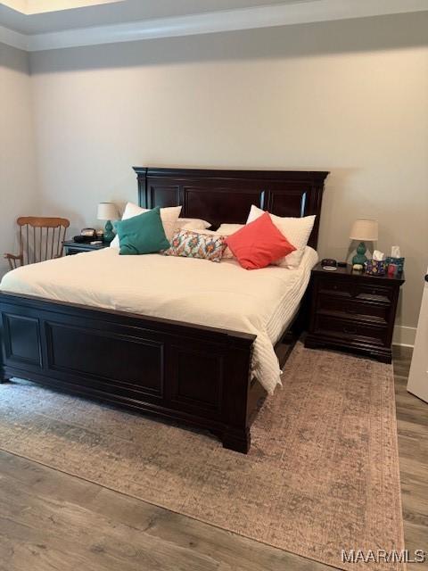 169 Foxfire Ct, Wetumpka, AL 36092 - bedroom with crown molding and wood finished floors