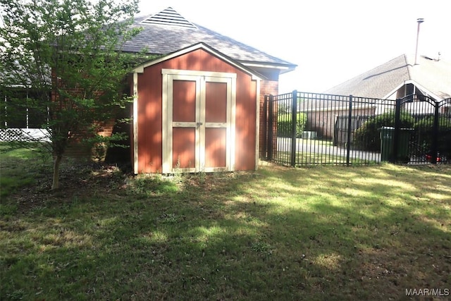 view of shed featuring fence
