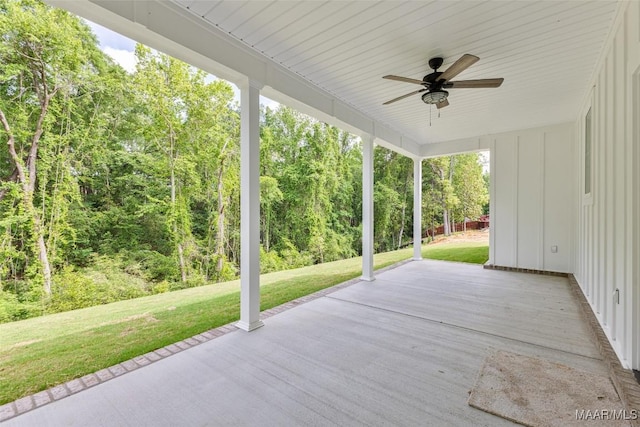 view of patio featuring ceiling fan