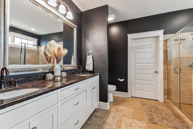 105 Bell Pkwy, Wetumpka, AL 36092 - full bathroom featuring double vanity, a sink, toilet, and a shower stall