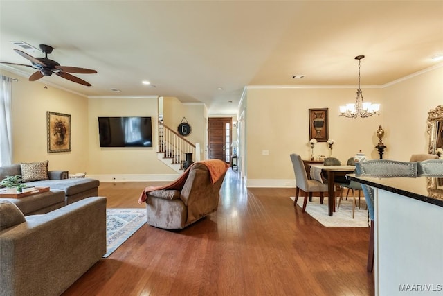 105 Bell Pkwy, Wetumpka, AL 36092 - living room with crown molding, baseboards, stairs, and dark wood-style floors