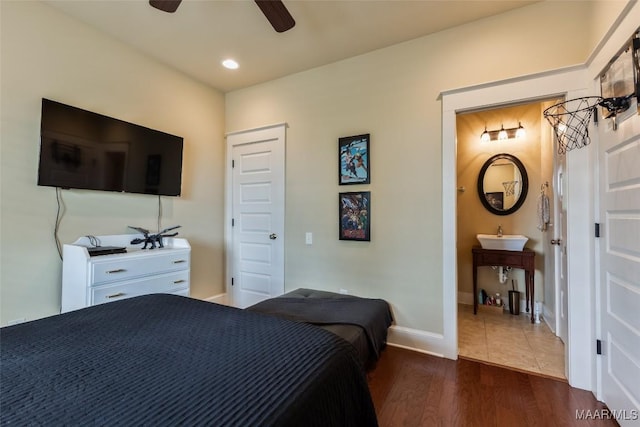 105 Bell Pkwy, Wetumpka, AL 36092 - bedroom with baseboards, ceiling fan, and dark wood-type flooring