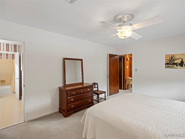bedroom with ceiling fan and light carpet