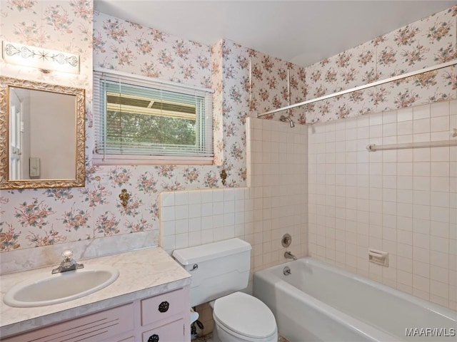 full bathroom featuring vanity, shower / bathtub combination, toilet, and wallpapered walls