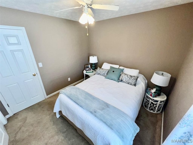 bedroom with baseboards, carpet, and ceiling fan