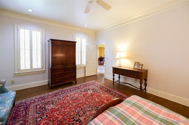 bedroom with multiple windows and wood finished floors