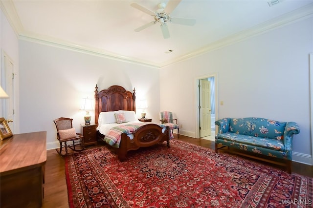 bedroom with baseboards, ornamental molding, a ceiling fan, and wood finished floors