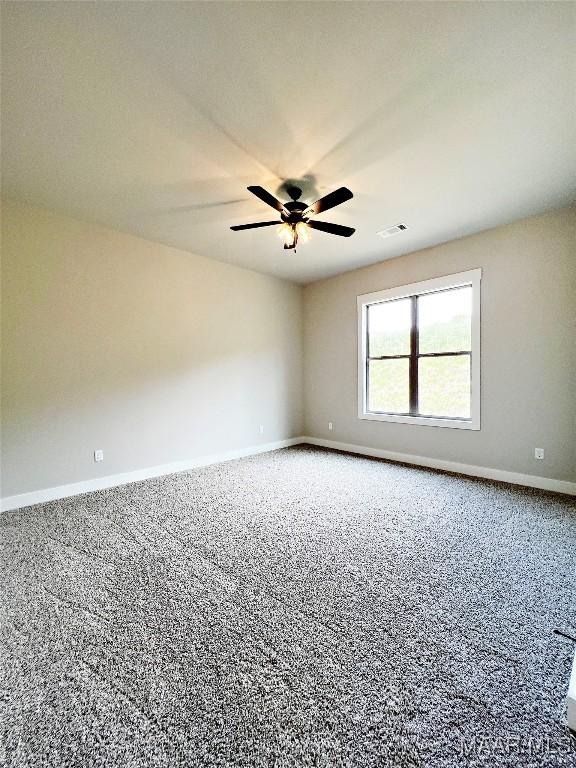 171 Mountain Laurel Rdg, Wetumpka, AL 36093 - carpeted empty room with baseboards and a ceiling fan