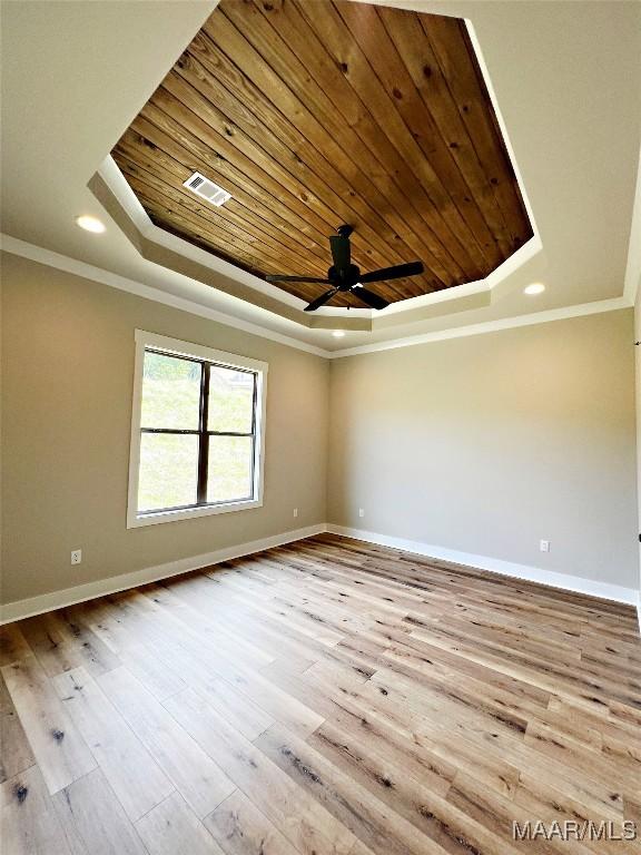 171 Mountain Laurel Rdg, Wetumpka, AL 36093 - spare room with a raised ceiling, wood ceiling, crown molding, baseboards, and ceiling fan