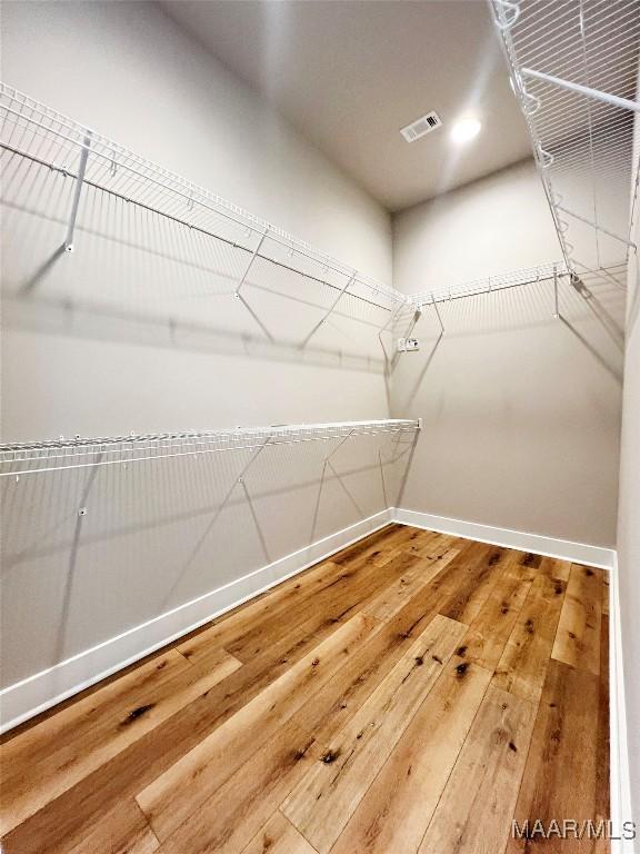 171 Mountain Laurel Rdg, Wetumpka, AL 36093 - spacious closet featuring hardwood / wood-style floors