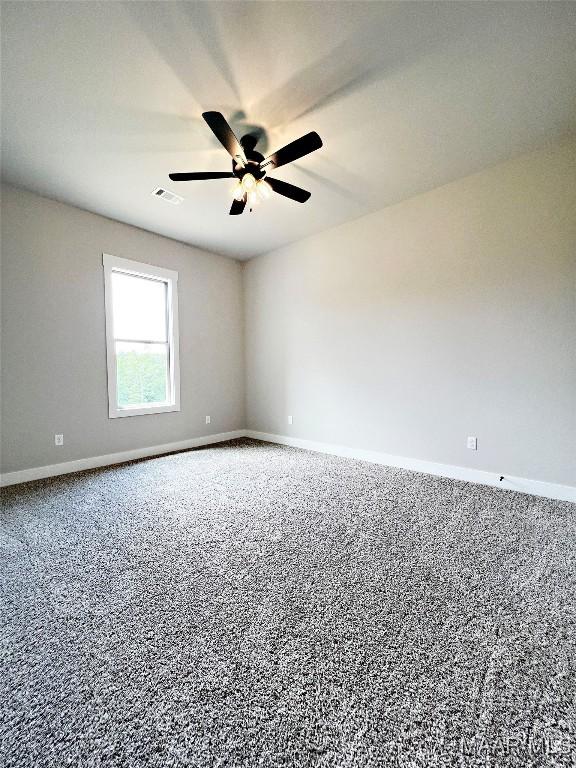 171 Mountain Laurel Rdg, Wetumpka, AL 36093 - empty room featuring ceiling fan, baseboards, and carpet floors